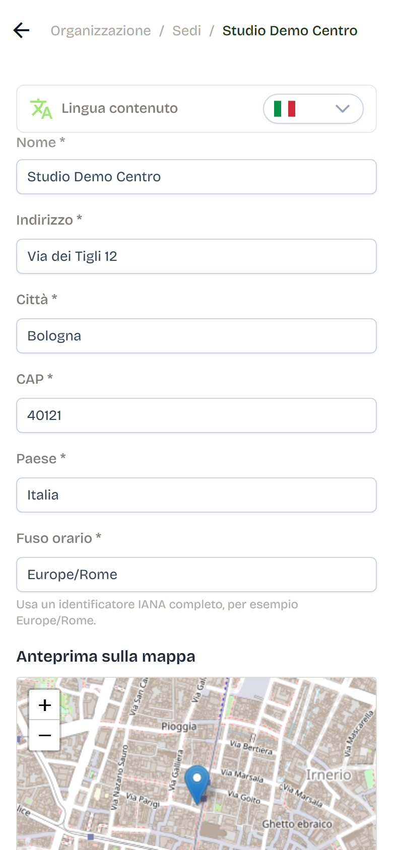 Studio Demo Centro location form with the address fields, the time zone and the map preview.